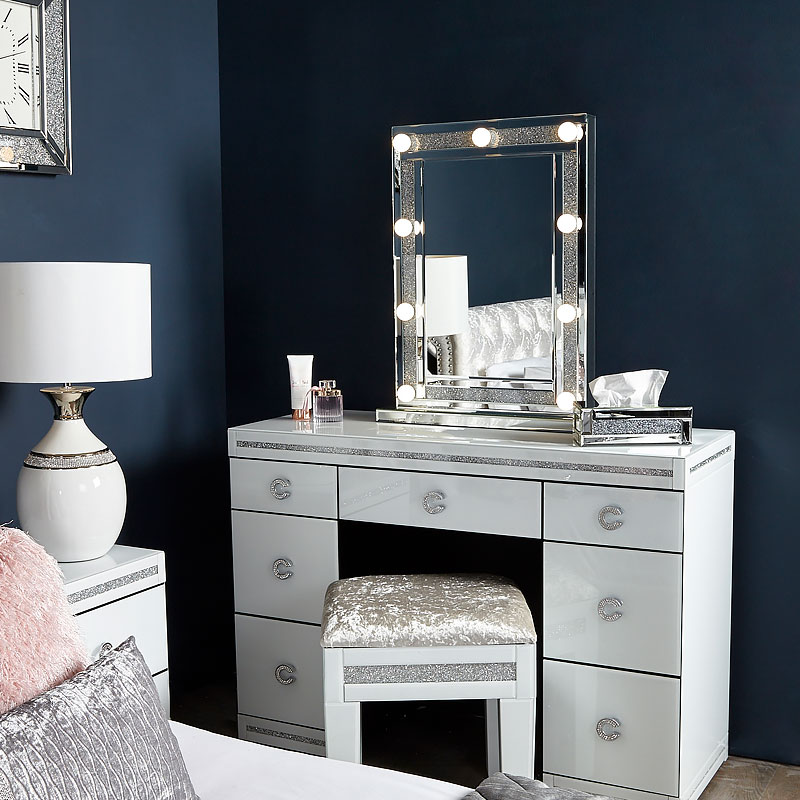 vanity table with mirror and lights