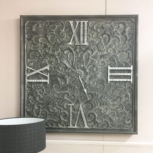 Giant Antique Grey Metal Wall Clock With A Raised Filigree Pattern