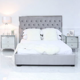 Grey King Size Bed With A Chrome Frame And Velvet Style Upholstery ...