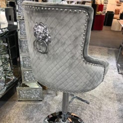 Grey Fabric And Chrome Upholstered Bar Stool With A Lion Ring Knocker