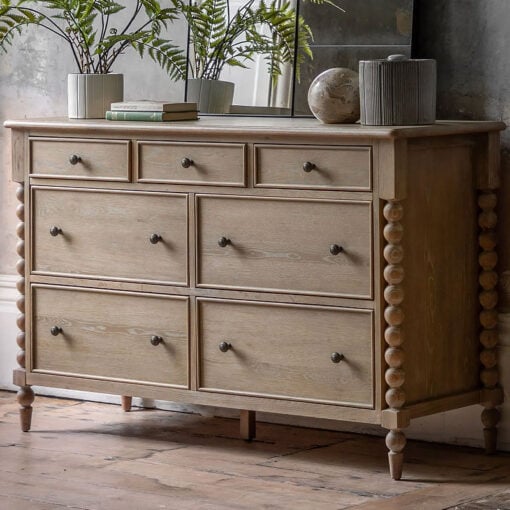 Rustic Country Cottage Light Oak Wood Large 7 Drawer Chest Of Drawers With Hand Carved Bobbin Detail Legs 140cm