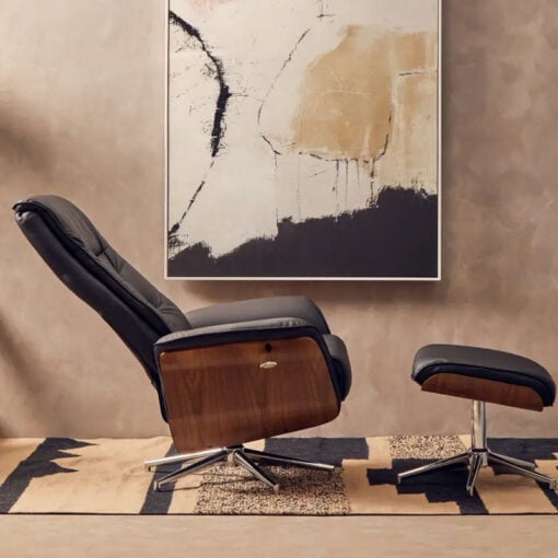 Industrial Black Faux Leather Recliner Armchair With A Footstool