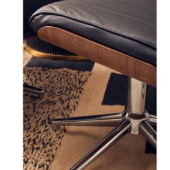 Industrial Black Faux Leather Recliner Armchair With A Footstool