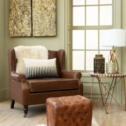 Industrial Brown Faux Leather Winged Studded Armchair With Carved Black Wood Legs And Wheels