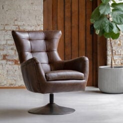 Industrial Mastermind Style Brown Tufted Leather And Bronze Metal Swivel Armchair