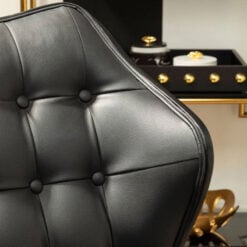 Mid Century Black Faux Leather And Black Wood Tufted Winged Accent Chair With A Curved Seat Mid Century Black Faux Leather And Black Wood Tufted Winged Accent Chair With A Curved Seat
