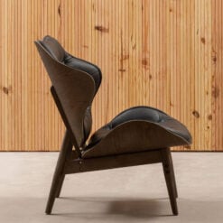 Mid Century Black Faux Leather And Black Wood Tufted Winged Accent Chair With A Curved Seat Mid Century Black Faux Leather And Black Wood Tufted Winged Accent Chair With A Curved Seat