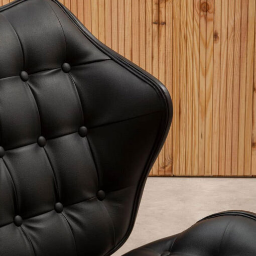 Mid Century Black Faux Leather And Black Wood Tufted Winged Accent Chair With A Curved Seat Mid Century Black Faux Leather And Black Wood Tufted Winged Accent Chair With A Curved Seat