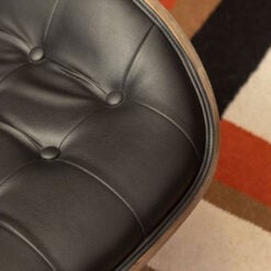 Mid Century Black Faux Leather And Light Wood Tufted Winged Accent Chair With A Curved Seat Mid Century Black Faux Leather And Light Wood Tufted Winged Accent Chair With A Curved Seat