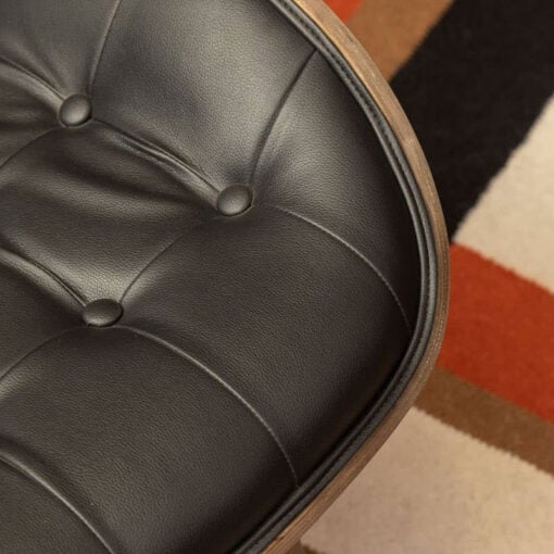 Mid Century Black Faux Leather And Light Wood Tufted Winged Accent Chair With A Curved Seat Mid Century Black Faux Leather And Light Wood Tufted Winged Accent Chair With A Curved Seat
