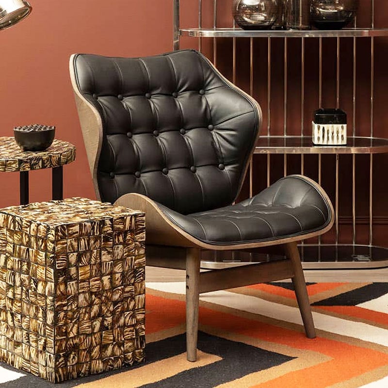 Mid Century Black Faux Leather And Light Wood Tufted Winged Accent Chair With A Curved Seat Mid Century Black Faux Leather And Light Wood Tufted Winged Accent Chair With A Curved Seat