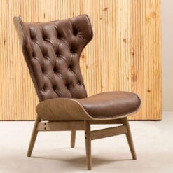 Mid Century Brown Faux Leather And Light Wood Tufted Winged High Back Accent Chair With A Curved Seat
